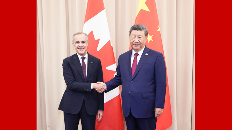习近平会见加拿大总理卡尼
